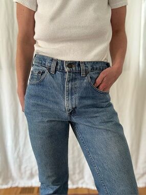 Vintage Levi’s 531 stonewash blue 90s raw hem high rise straight leg
